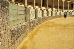 The Plaza de Toros de Ronda  is a Bullring in Ronda, it has a diameter of 66 metres (217 ft), surrounded by a passage formed by two rings of stone. There are two layers of seating, each with five raised rows and 136 pillars that make up 68 arches.