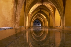Located in the Royal Alcazar of Seville, the baths are rainwater tanks beneath the Patio del Cruces. The Alcazar is a UNESCO World Heritage Site.